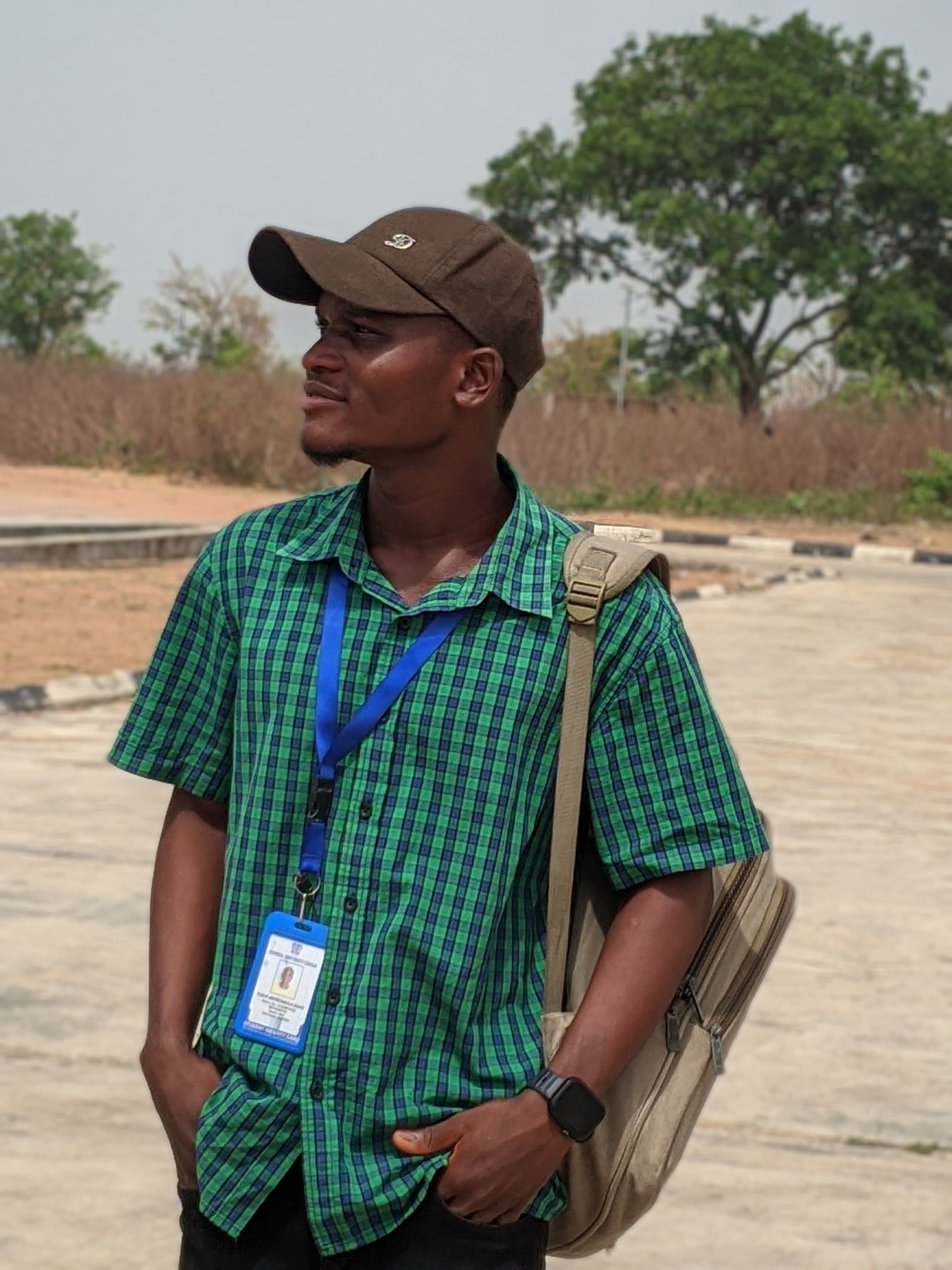 David Yusuf smiling on campus